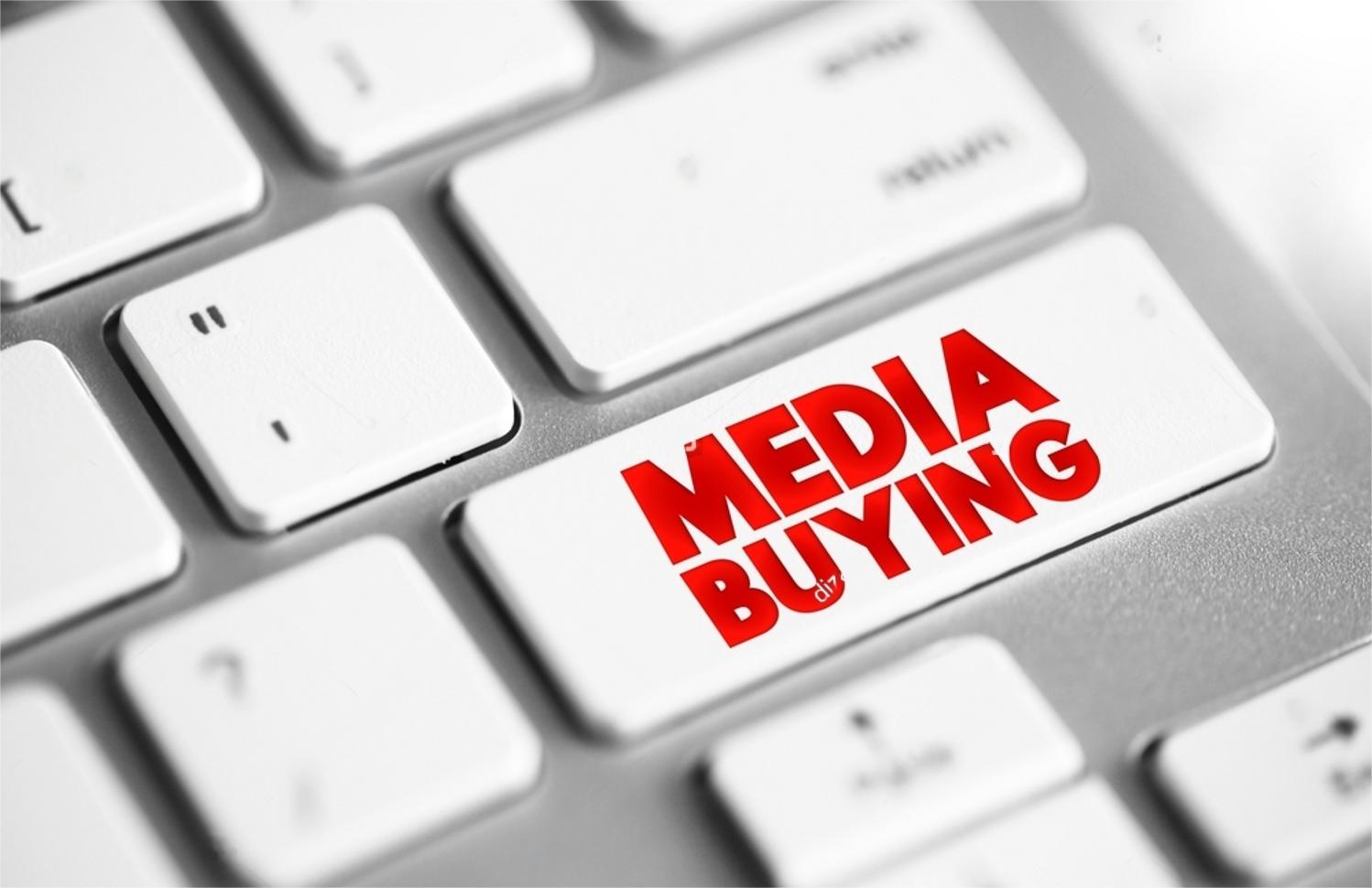 stock-photo-media-buying-process-used-in-paid-marketing-efforts-text-button-on-keyboard-2076708865.jpeg